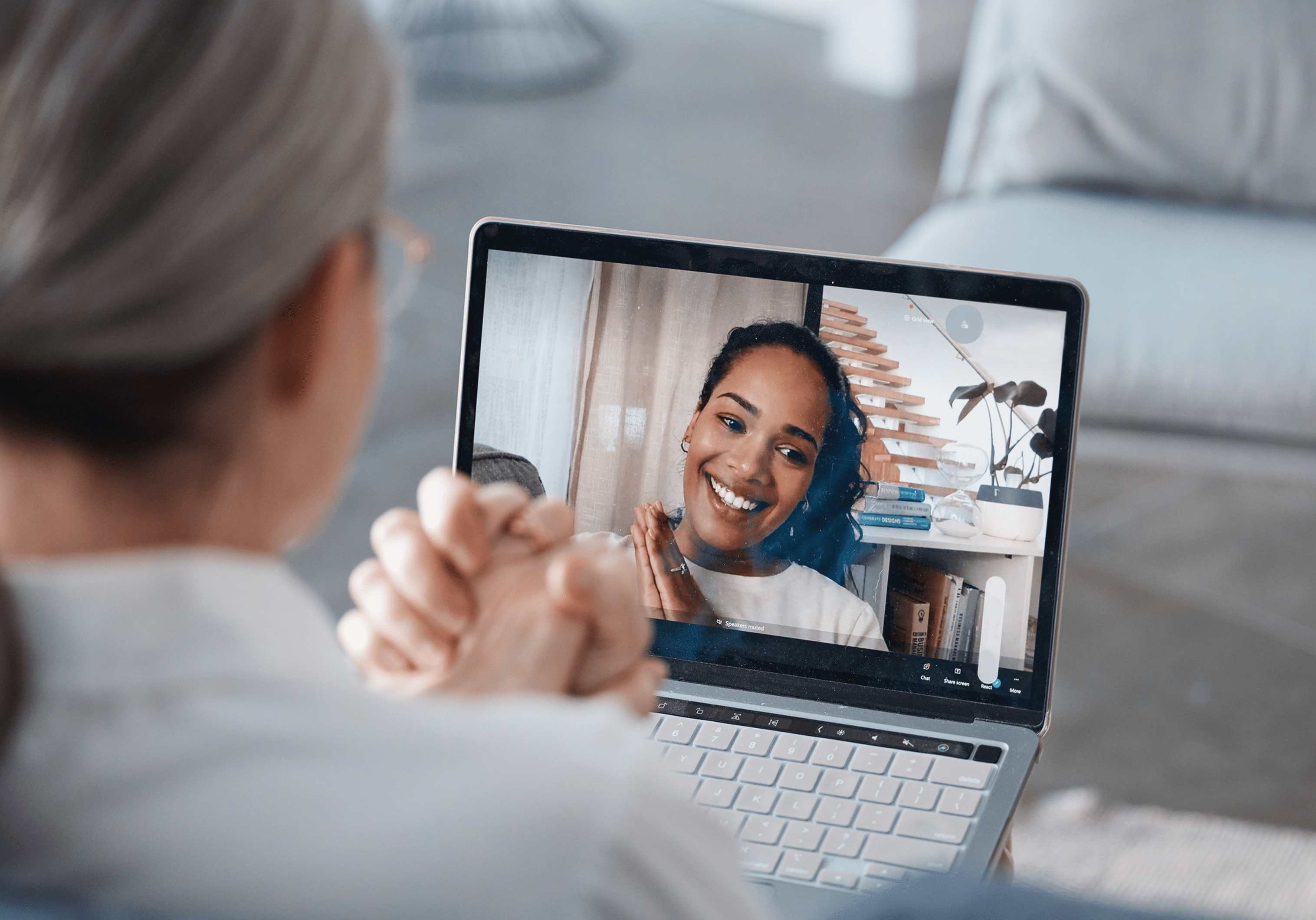 Video call between two people on laptop.